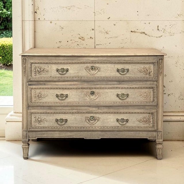 An 18th century Liégeois commode that brings neoclassical refinement to the warmth and utility of Country French...