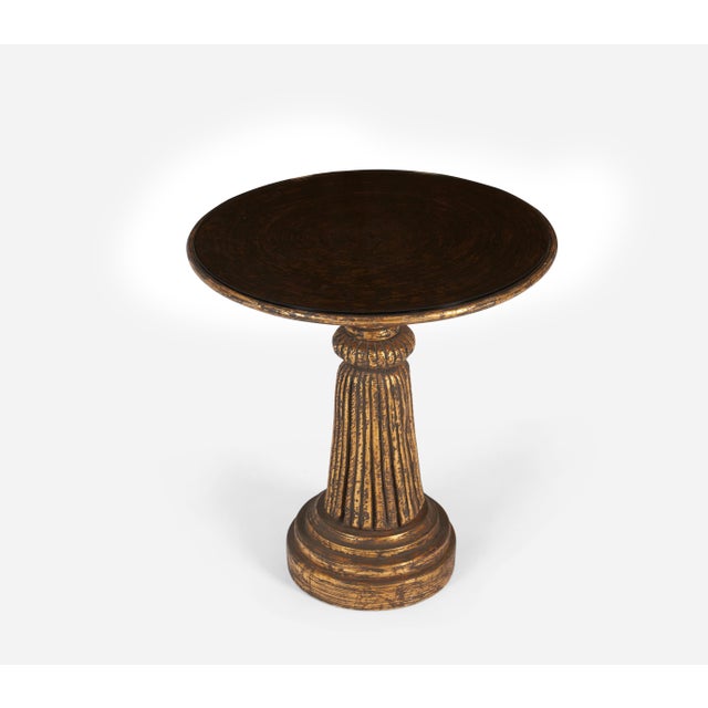 Beautiful gilded side table in form of a hassle with smoked glass top. Made in Italy, circa 1940s.