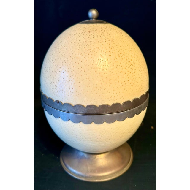 Vintage Italian ostrich egg table lighter with silver/pewter trim. I found this piece in an antique store in Rome. Just...