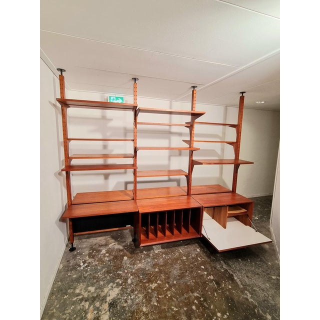 Rare Poul Cadovius room divider, made of teak. 1960s. Can be placed freely in the room or you can place the telescopic...
