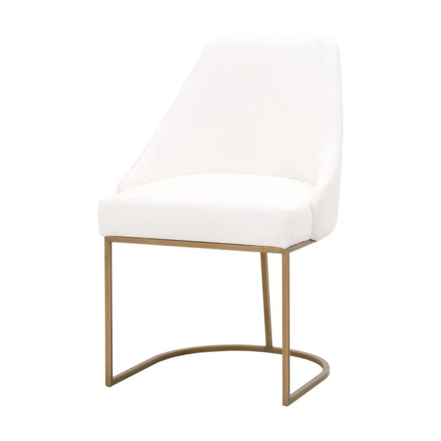 Upgrade your dining area with the Parissa Dining Chair by Essentials For Living. This chair represents a harmonious fusion...