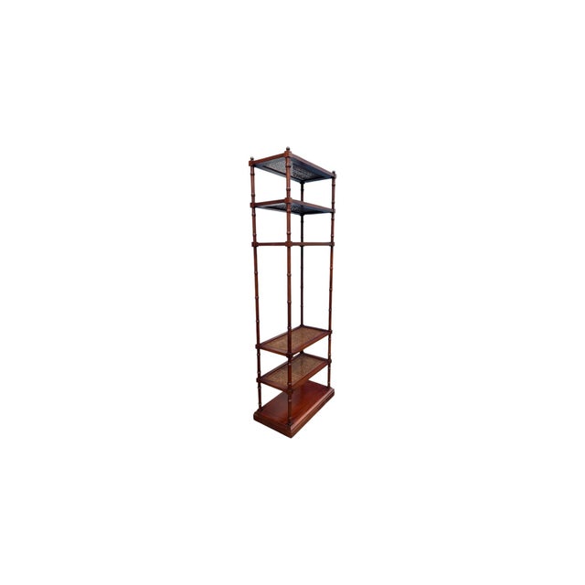 The Hickory Chair Co Cane/Glass Faux Bamboo Etagere is a stylish and unique piece of antique furniture. Standing at 83...