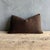 12x20 100% wool Color: Brown A dark brown wool lumbar pillow. Soft, brushed wool in a rich espresso tone adds cozy texture...