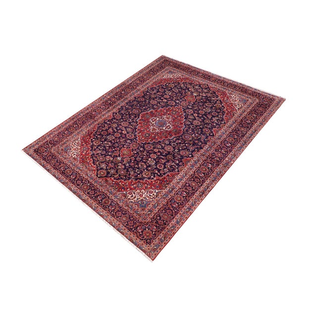 This is a magnificent, hand-knotted wool rug that will instantly elevate the elegance and warmth of any space in your...