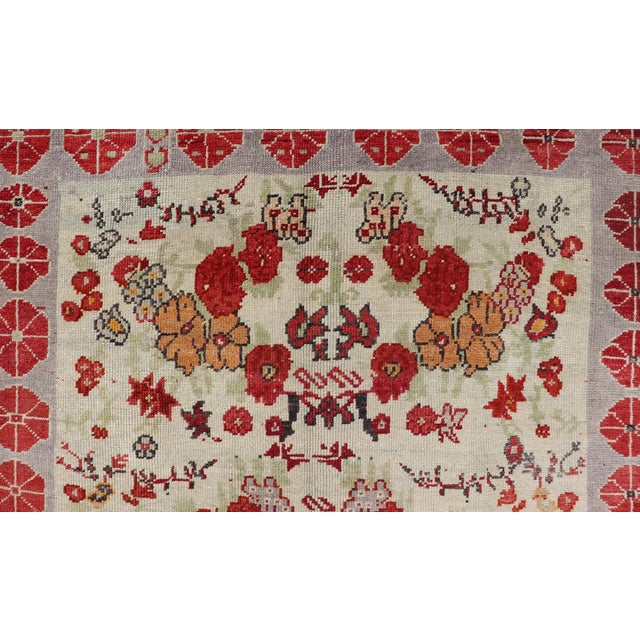 Mid 20th Century Vintage Turkish Oushak Rug in All-Over Flower Design Background & Simple Boteh Border For Sale - Image 5 of 13