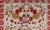 Mid 20th Century Vintage Turkish Oushak Rug in All-Over Flower Design Background & Simple Boteh Border For Sale - Image 5 of 13
