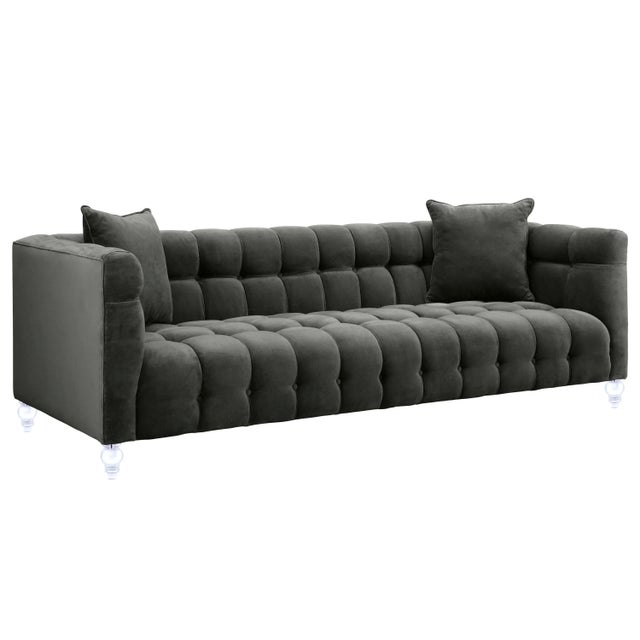 Our Bea sofa is a true beauty. This rich velvet upholstered sofa is designed with a deep seat, luxe tufting and Lucite...