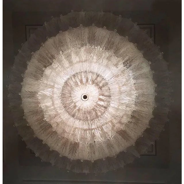 Realized in pure Murano glass, each chandelier consists of an incredible number of leaves. The structure is plated with...