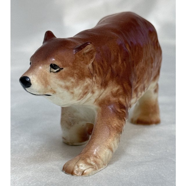 Add a touch of woodland charm to your collection with this **vintage Relco ceramic porcelain brown bear figurine**,...