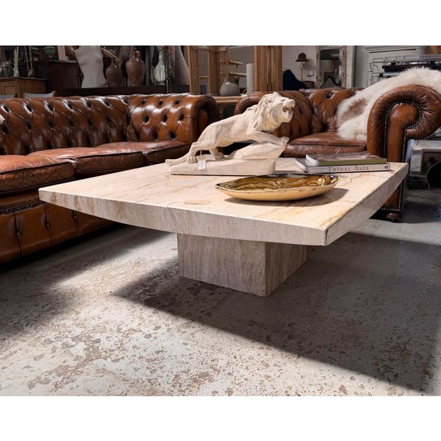 Well proportioned solid travertine coffee table from Italy. Top can be taken off for safe transportation