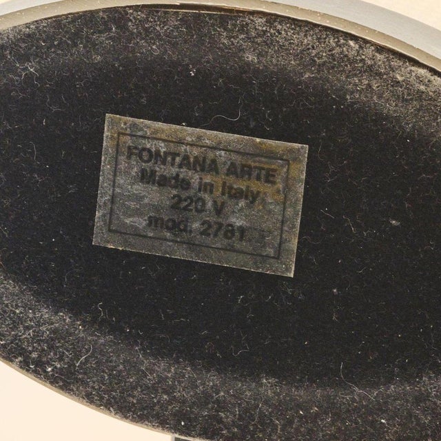 Pirellina table light is a work deigned by Gio Ponti in 1967. Made by Fontana Arte, Milan. H. 36 x 17 x 8.5 cm. Cast...