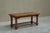 This is a wonderful, rare, early and untouched 1940s or 1950s coffee table with a cognac leather top in solid oak and...