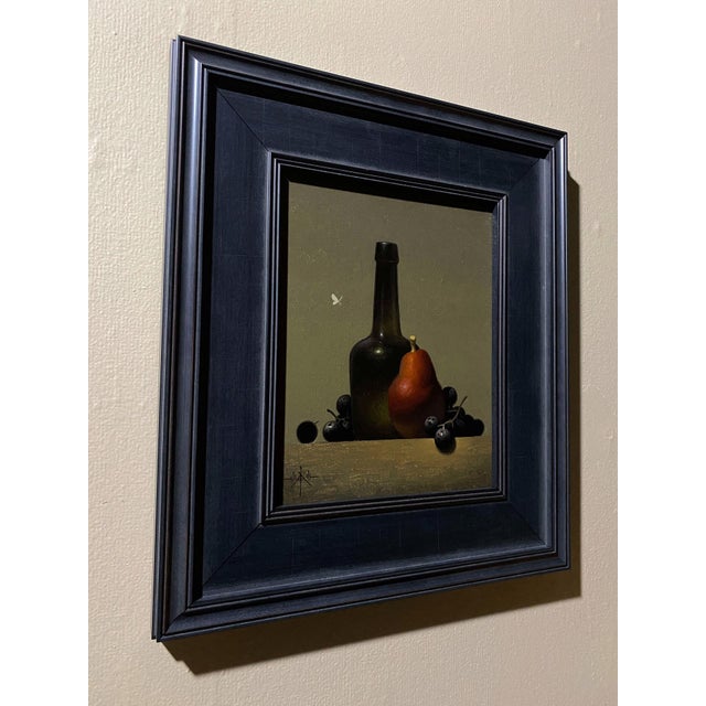 Realism Red Anjou & Green Glass by Blair Atherholt | Oil on panel Still life of a bottle, pear, and grapes For Sale - Image 3 of 5