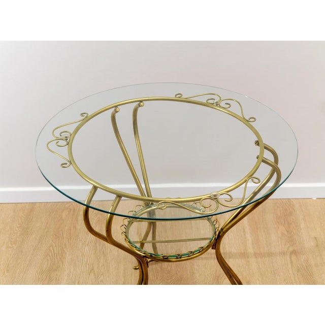 Brass round coffee table, Made in Italy, 1950s. Elegant round coffee table, Made in Italy, made in the 1950s, with brass...