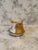 Beautiful demitasse creamer. Hand-painted gilded and floral accents. Circa 1900s Marked SIL accents. Small pint chips on...