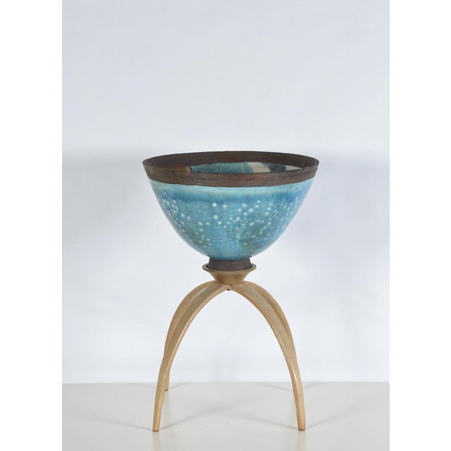 This striking studio art pottery bowl on a wooden stand, is by noted british potter catriona mcleod (born 1946), known for...