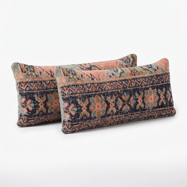 This 11'' x 35'' & 12'' x 36'' pillow cover set was made from authentic Turkish rug pieces — salmon pink field with navy...