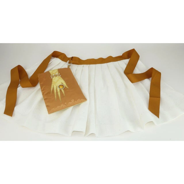 For the hostess with the mostest! Glam C.1960 pleated apron and attached oven mitt embellished with a stylized hand. The...