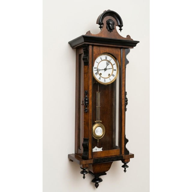 Antique German Mechanical Wooden Wall Clock with pendulum In his juice! Step back in time with this breathtakingly...