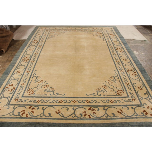 Hand knotted in wool, a fabulous Peking rug from Rug & Kilim’s Antique & Vintage Collection. A lavish 9x12 scale...