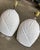 Pair of sculptural shell-inspired light fixtures featuring a beautifully ribbed, organic form in a textured white finish....