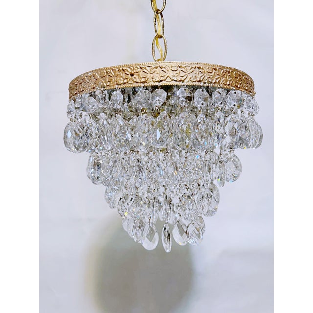 Infuse your home with a captivating layer of romance, warmth, and mid-century shimmer with this exquisite vintage crystal...
