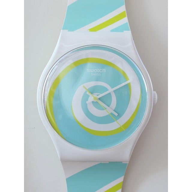 Origin: Italy / SwitzerlandMaterial: Hard plasticHeight: 210 cm Details Brand: Swatch Model: Maxi Spiral - Wall Clock...