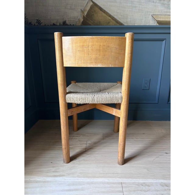 Pair of Attributed Charlotte Perriand Rush Meribel dining chairs. Purchased from Galerie Provenance. Light wood frame,...