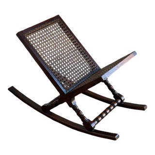 Danish Modern Rocking Magazine Rack in Dark Wood and Cane Denmark 1960s For Sale