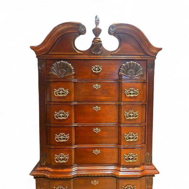 Composed of two separate pieces, this stately highboy dresser from Kathy Ireland Home blends classic Queen Anne elegance...