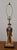 Add a strike of mid-century Americana to your interior with this exceptional vintage 1960s Colonial soldier table lamp....
