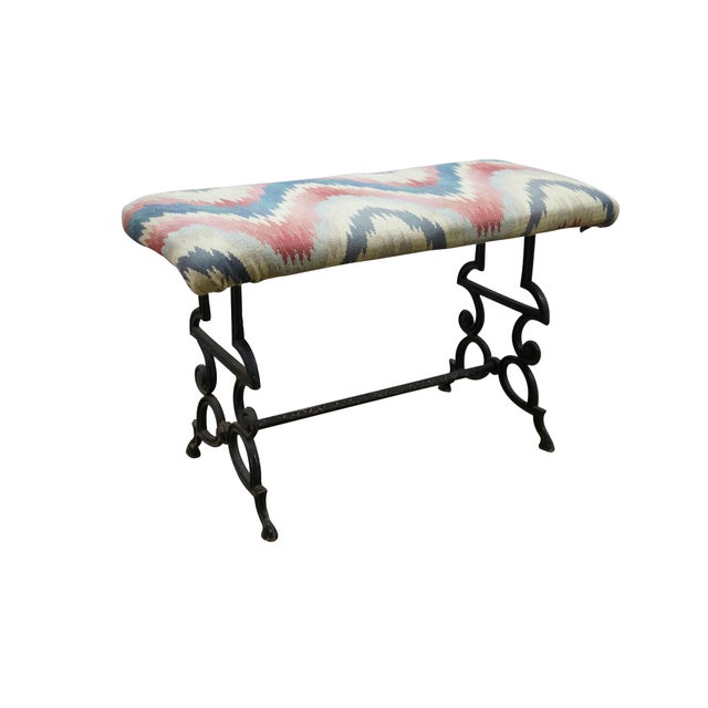 Antique Victorian cast iron piano bench / footstool / ottoman featuring Spanish Revival styling with a chevron flame...