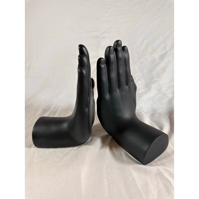 Very cool and unusual black hand book ends