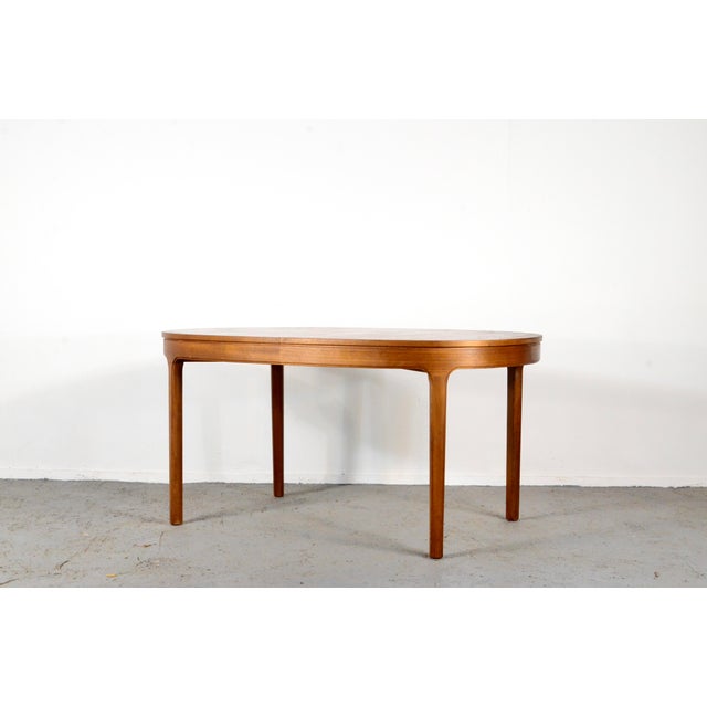 Mid-Century Modern Extendable Oblong Dining Table in Teak from Nathan, 1960s, in Very Good conditions. Designed 1960 to...