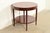 An elegant modern Regency style two-tier center table or tea table By Kindel Furniture USA, Circa Late 20th Century...