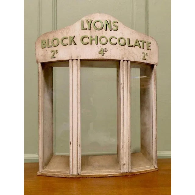 A lyons sweet shop chocolate dispensing cabinet a very rare piece, this piece would have been loaned to the shop keeper...