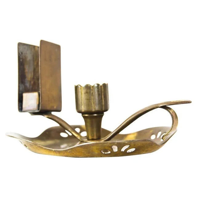 Art Deco candleholder with matchbox holder for wine cellars, Vienna, circa 1920s. Polished and stove enameled.