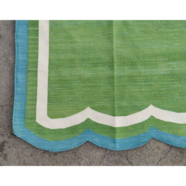Handmade Cotton Vegetable Dyed Scalloped Edge Rug Moss Green With Teal Blue Border - 6x9 For Sale - Image 10 of 11
