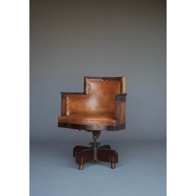 An impressive Art Deco or Amsterdam School desk chair - The chair's mechanism allows it to swivel and allows the height to...