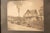 Framed antique sepia photograph of a Wisconsin street at the turn of the century.