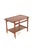A beautifully designed teak trolley. This trolley owes its lovely, timeless look to the flowing lines in its design; both...
