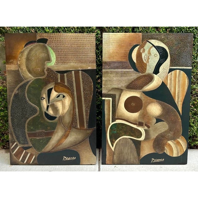 Pair Mid-Century Picasso-Style Carved & Gilded Wood Panels attributed to Enrico Baj wall sculptures The Pair of carved and...