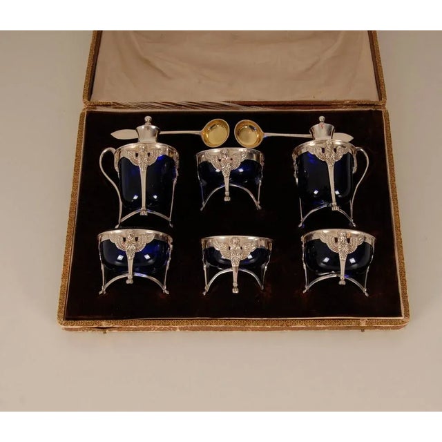 French Napoleonic Empire table set "return from Egypt" Made of sterling silver and cobalt blue liners Collectible for it's...