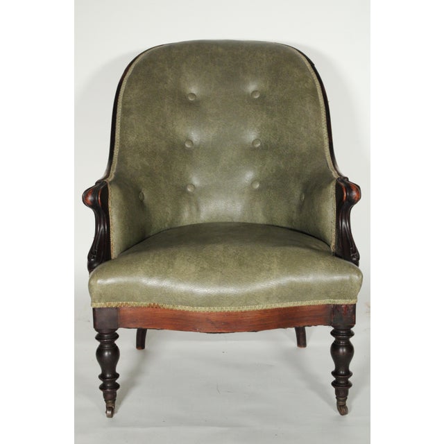 Pair of Napoleon III rosewood bergeres, circa 1870. With a narrow rose wood crest rail, leatherette and button upholstered...