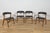 A set of four chairs was produced in Denmark in the 1960s. Chairs with an interesting form combined with high...