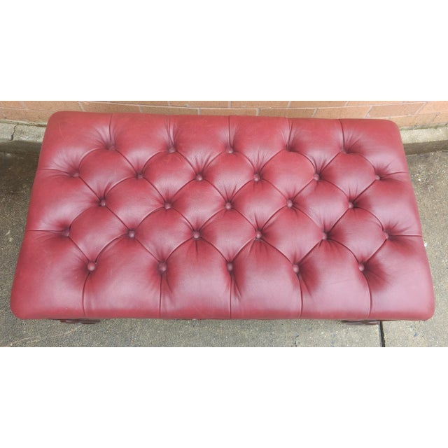 A Whittemore-Cherrill Mahogany Brass Nail Trims and tufted Maroon Top Grain Leather Upholstered Bench / Ottoman in great...