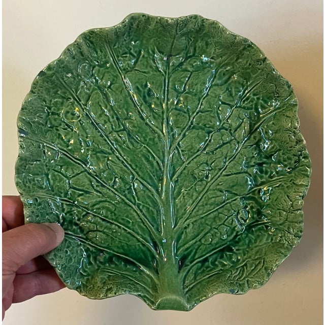 Antique Portuguese majolica pottery green glazed cabbage or lettuce leaf serving dish. Naturalistically molded with...