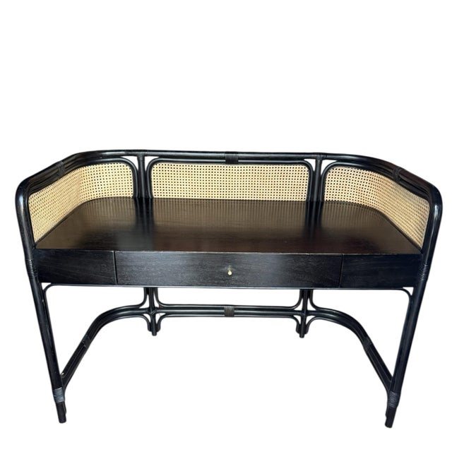A smart and generously sized writing desk. Rattan frame with large work surface, large single drawer and a caned gallery....