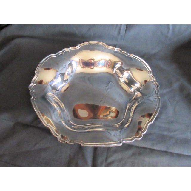 A vintage sterling silver bowl by Shreve and Company, San Francisco. Bowl weigh 14.4 ounces. Measures 11 ½” wide and 2”...