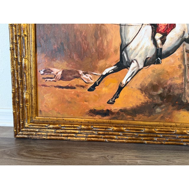 This impressive large oil on canvas painting depicts a dramatic fox hunting scene, capturing a rider in a classic red...